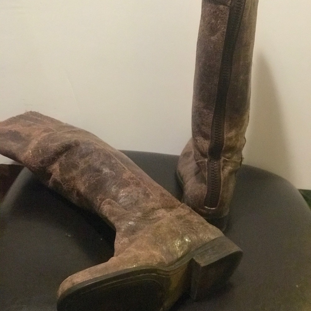 Distressed leather boots by Steve Madden